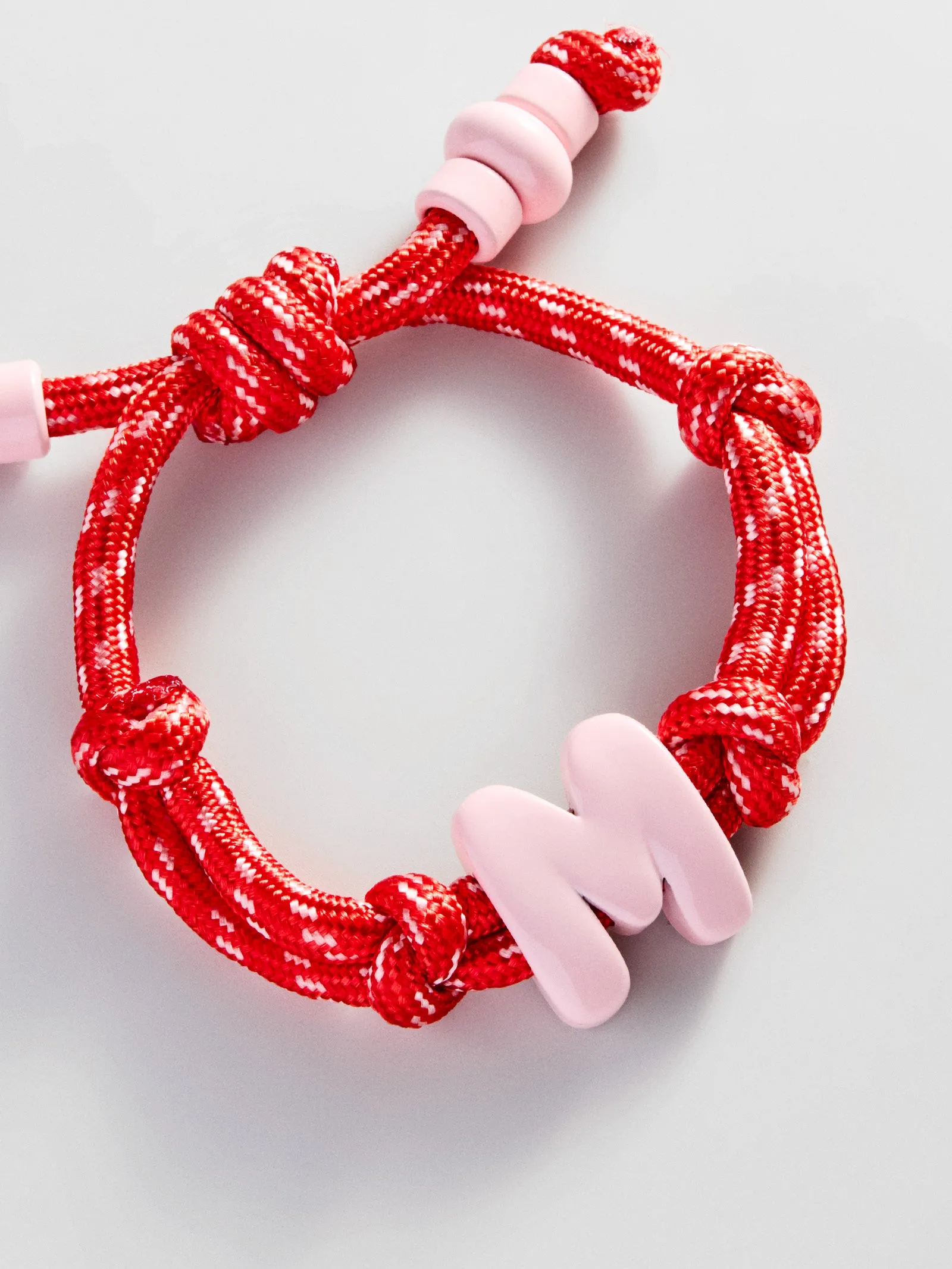 Knotty Enamel Initial Custom Bracelet - Red/Pink Single Letter sold by BaubleBar product image thumbnail 4