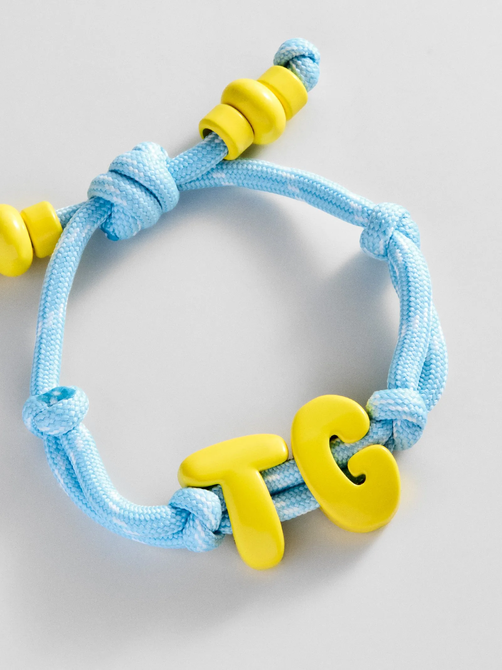 Knotty Enamel Initial Custom Bracelet - Blue/Yellow Double Letter sold by BaubleBar product image thumbnail 3