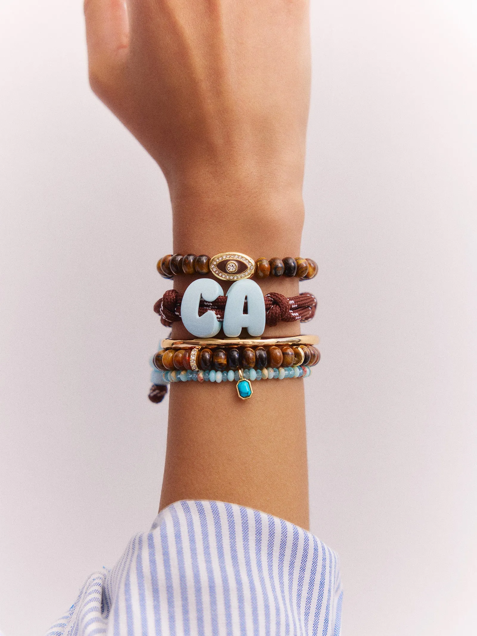 Knotty Enamel Initial Custom Bracelet - Brown/Blue Double Letter sold by BaubleBar product image thumbnail 2
