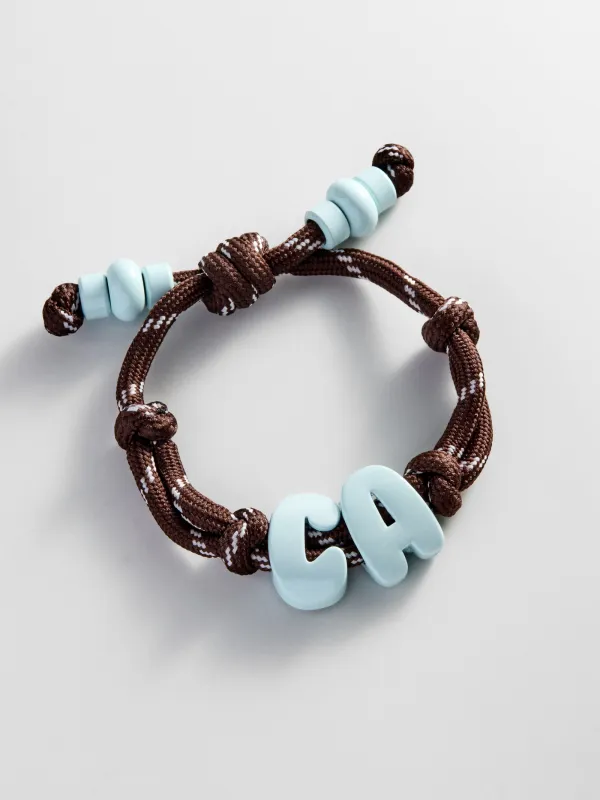Knotty Enamel Initial Custom Bracelet - Brown/Blue Double Letter made by BaubleBar