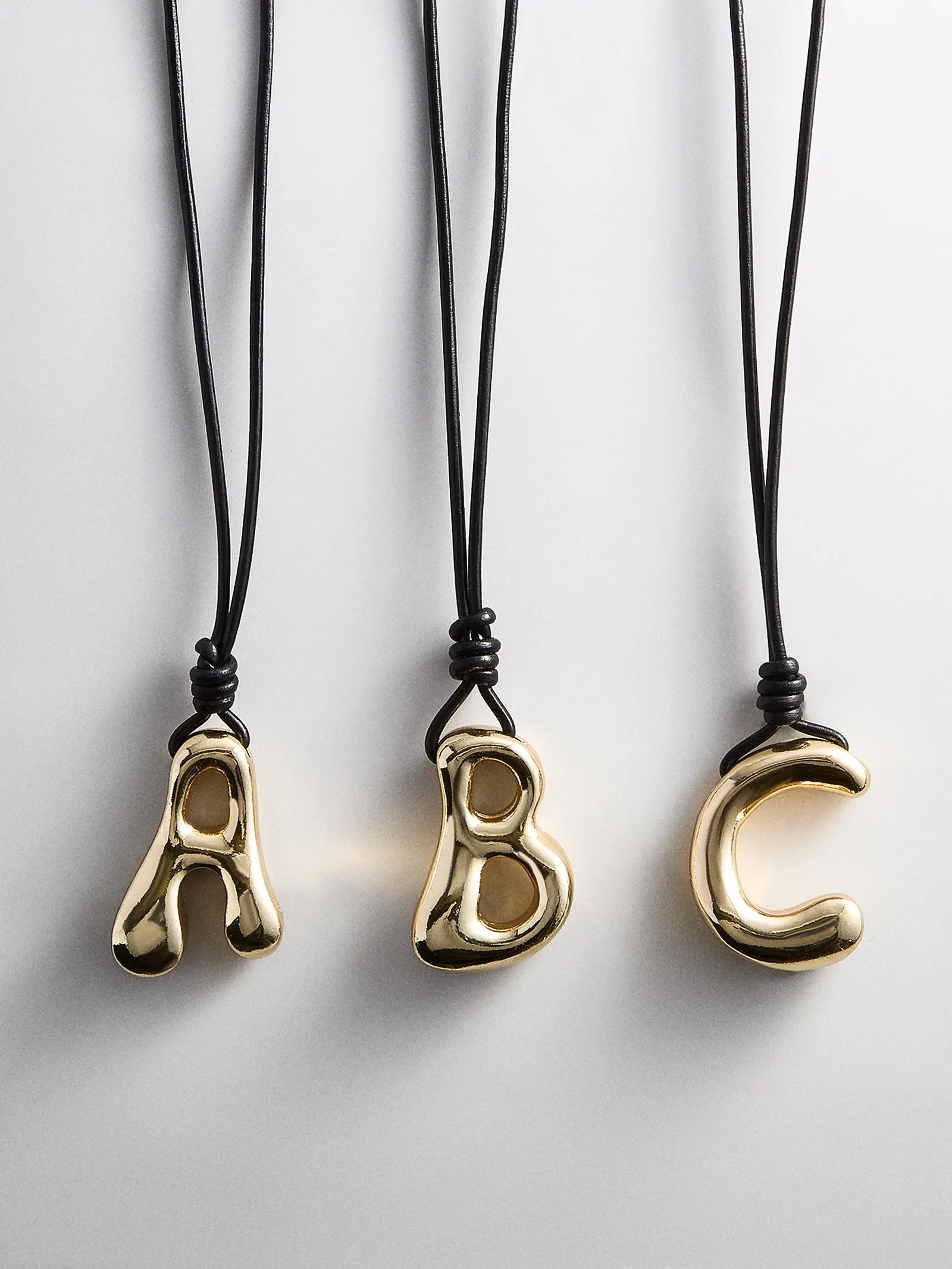 Cord Initial Necklace - Gold sold by BaubleBar