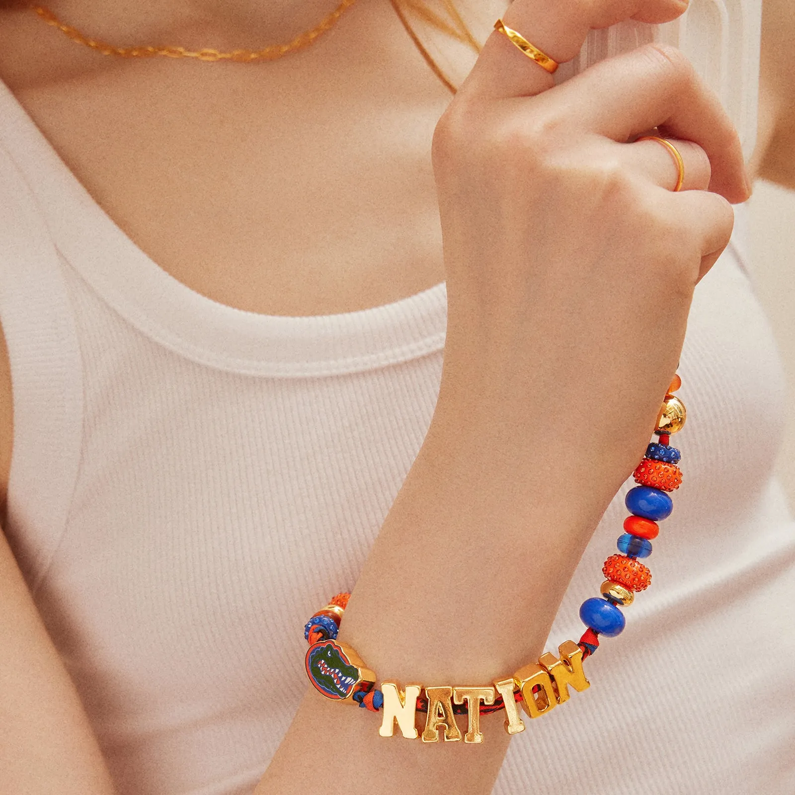 University of Florida Beaded Bandana Phone Charm - University of Florida sold by BaubleBar product image thumbnail 2