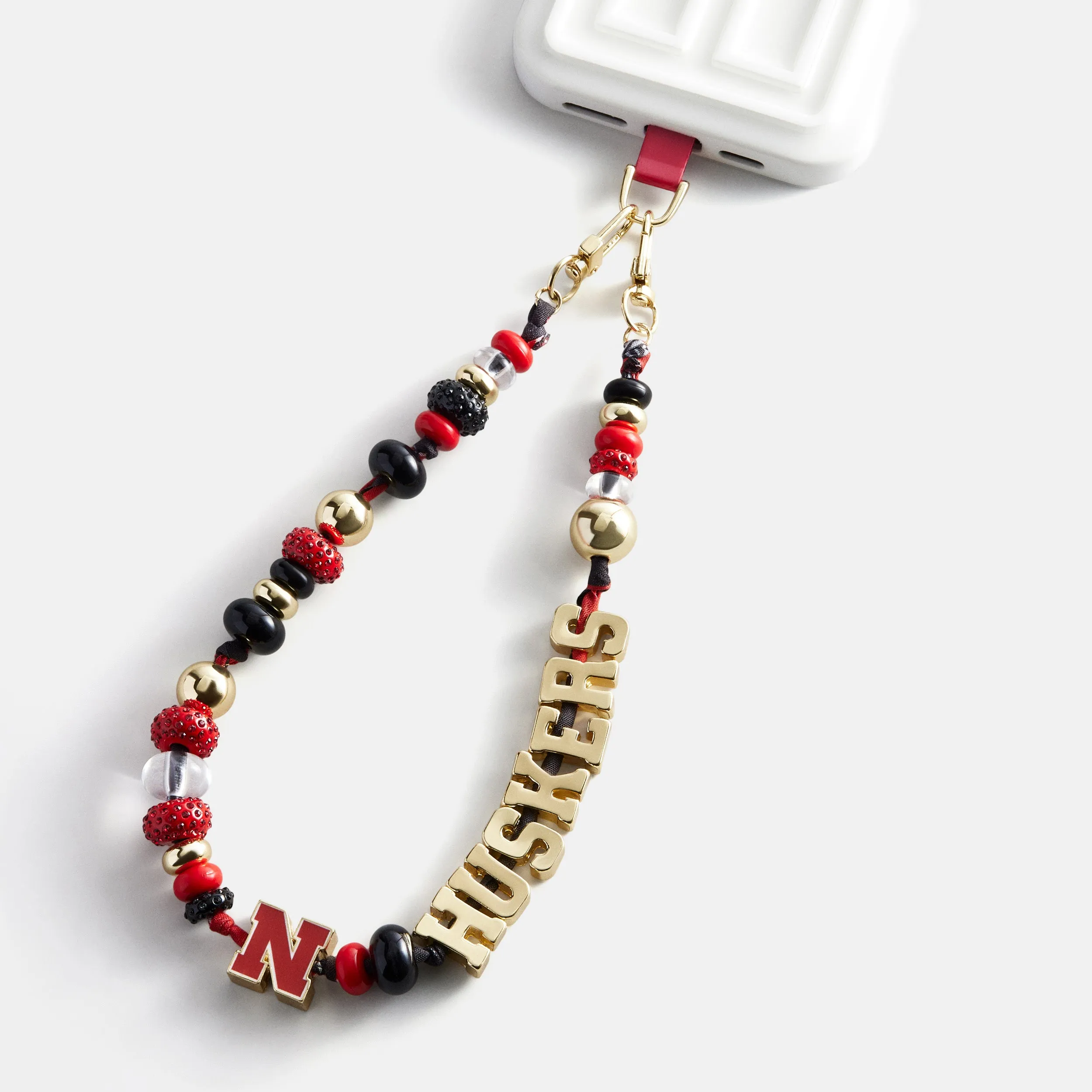 University of Nebraska Beaded Bandana Phone Charm - University of Nebraska sold by BaubleBar product image thumbnail 3