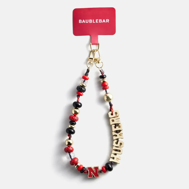 University of Nebraska Beaded Bandana Phone Charm - University of Nebraska made by BaubleBar