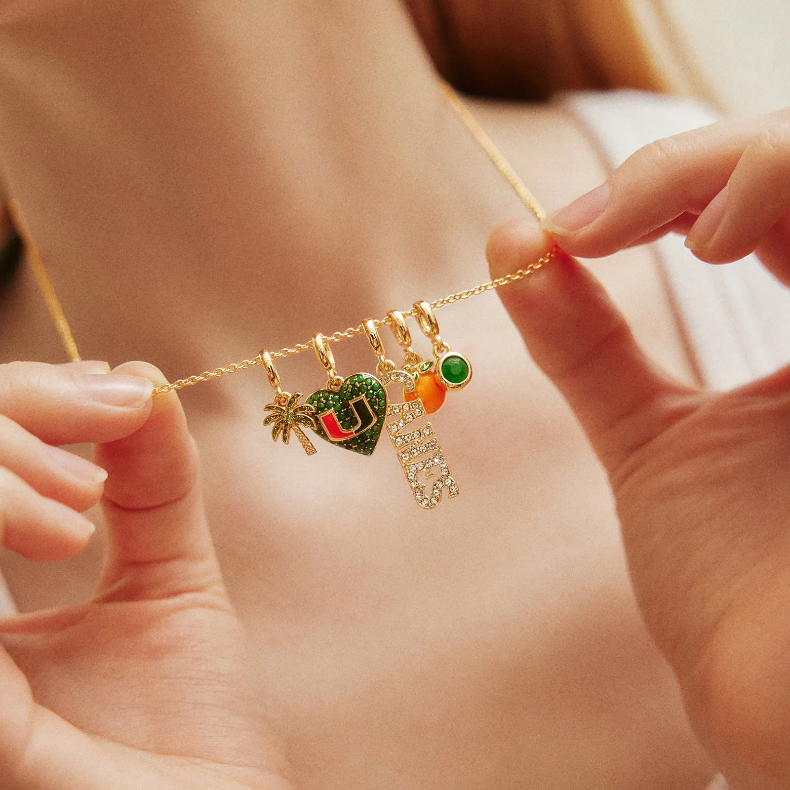 University of Miami Cluster Charm Necklace - University of Miami sold by BaubleBar product image thumbnail 2