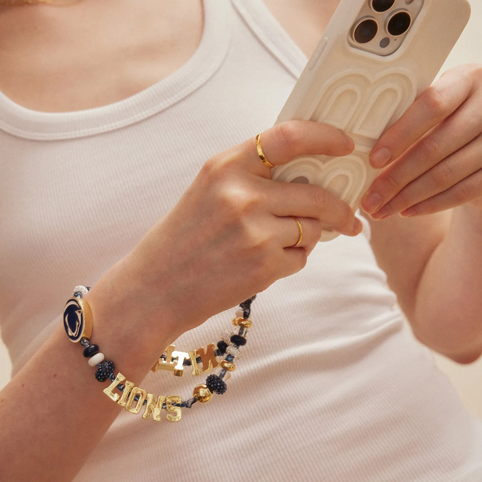 Penn State University Beaded Bandana Phone Charm - Penn State University sold by BaubleBar product image thumbnail 2