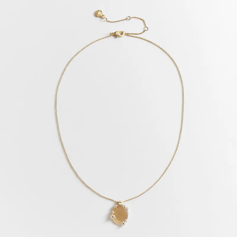 Nancy Gold Pendant Necklace made by BaubleBar