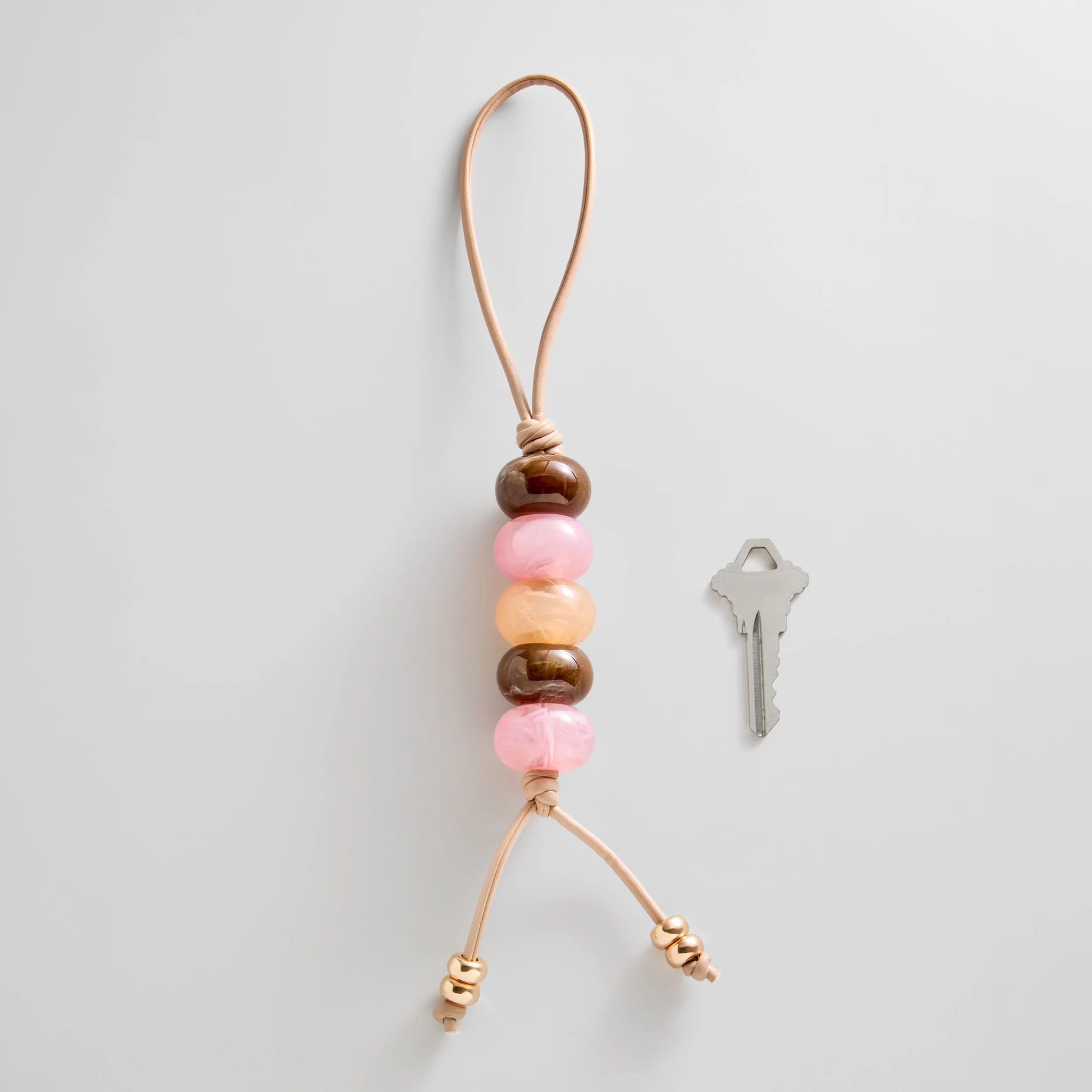 Bead My Guest Bag Charm sold by BaubleBar product image thumbnail 4