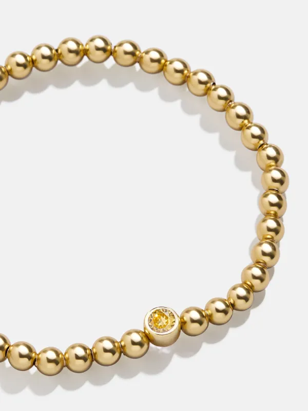18K Gold Birthstone Pisa Bracelet - Topaz sold by BaubleBar