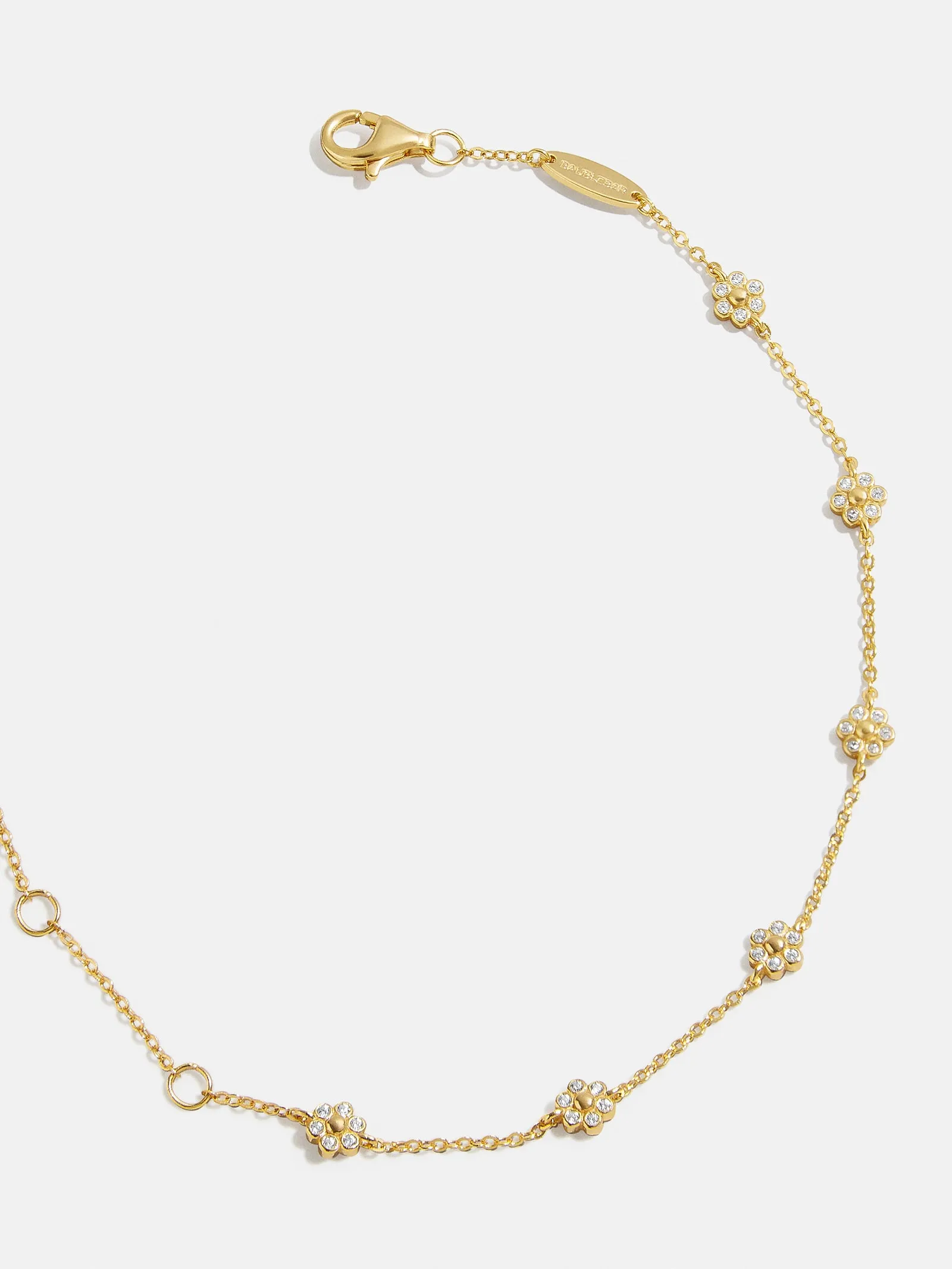Petunia 18K Gold Bracelet - Clear Flower sold by BaubleBar