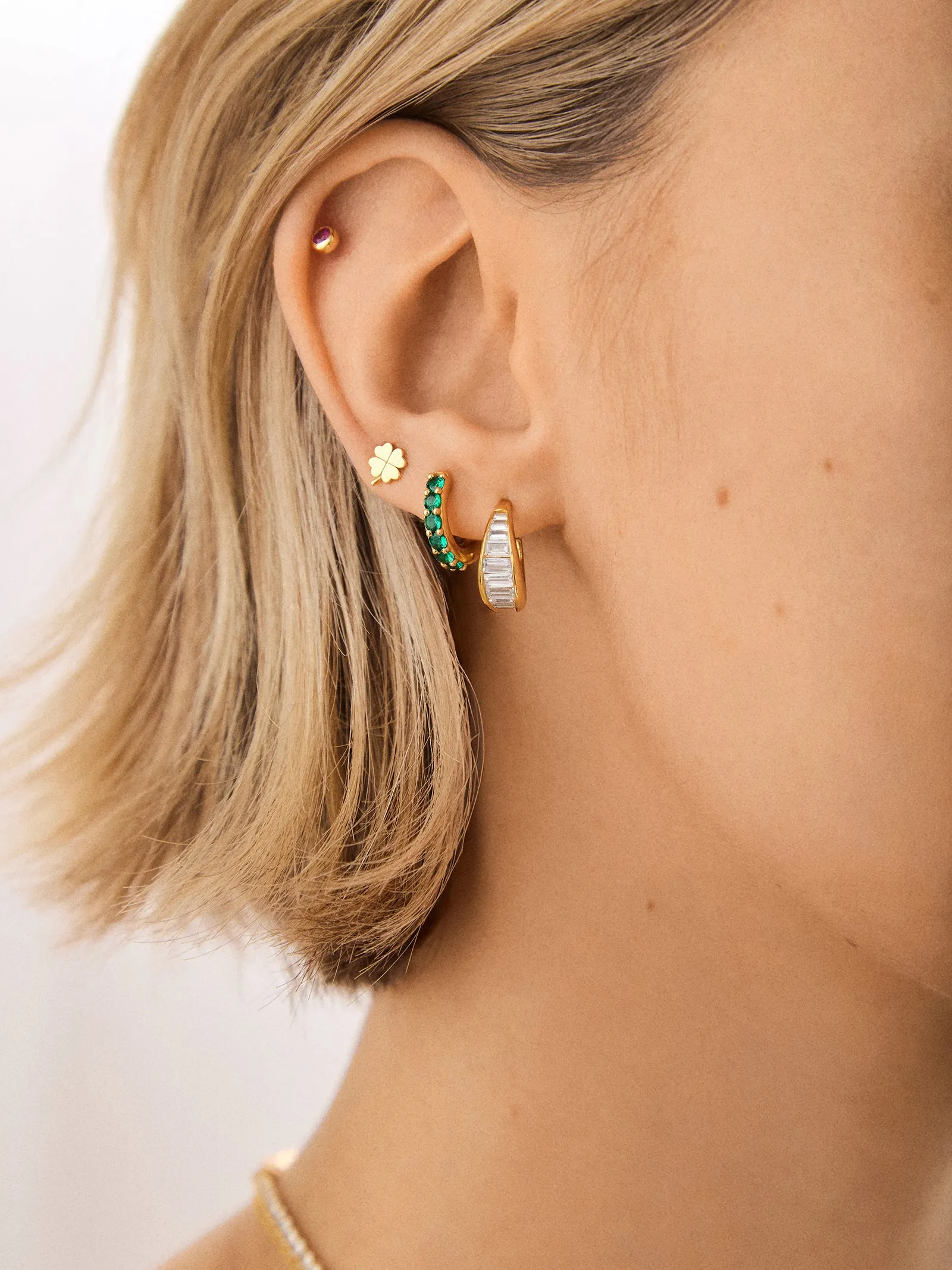 18K Gold Birthstone Huggie Earrings - Peridot sold by BaubleBar product image thumbnail 2