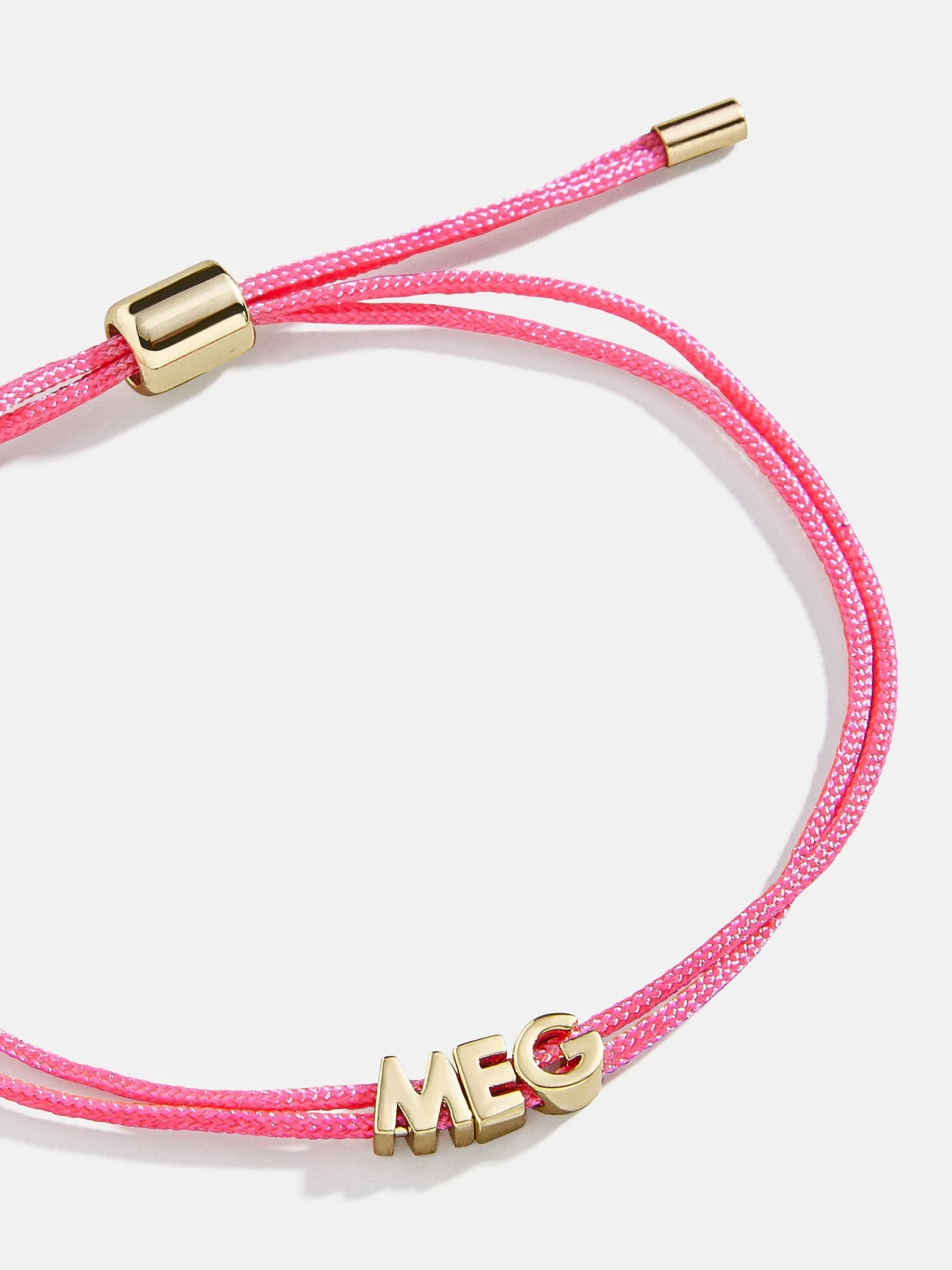 Custom Cord Bracelet - Neon Pink sold by BaubleBar
