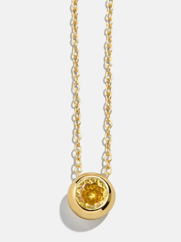 18K Gold Birthstone Pendant Necklace - Topaz sold by BaubleBar