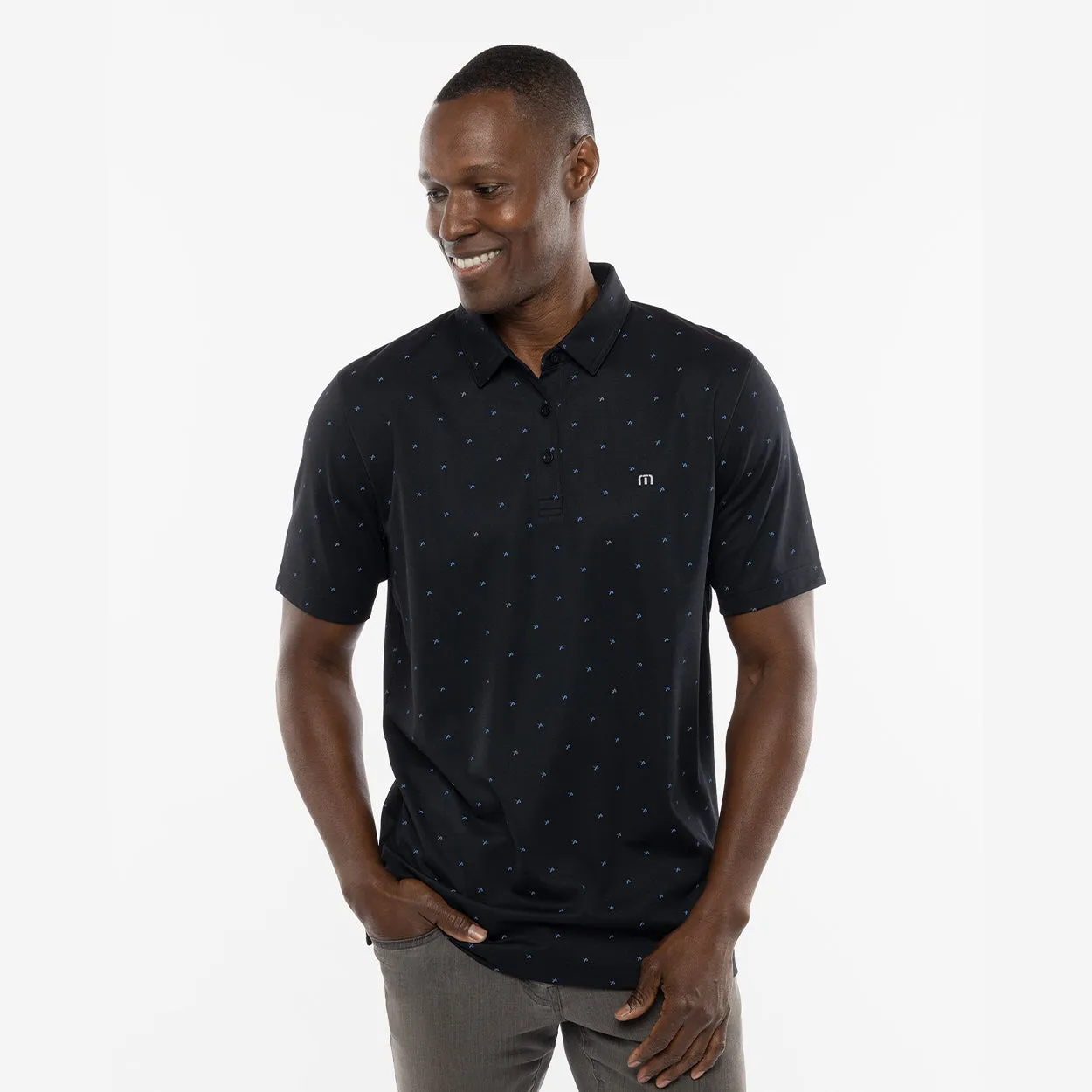 BAUER // TRAVIS MATHEW ON THE SCREWS POLO BLACK sold by Bauer