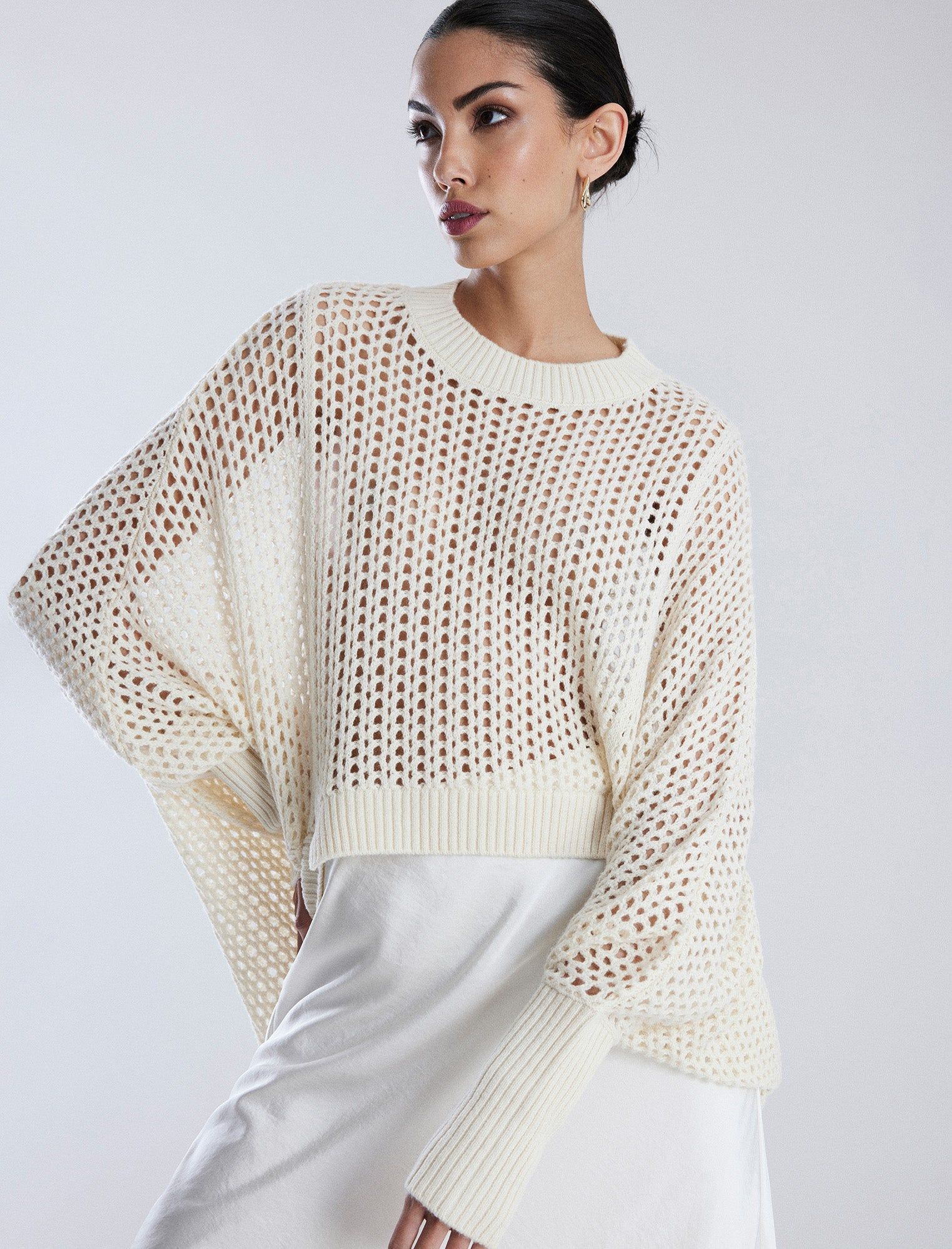 Open Knit High-Low Cocoon Sweater sold by BCBGMaxAzria