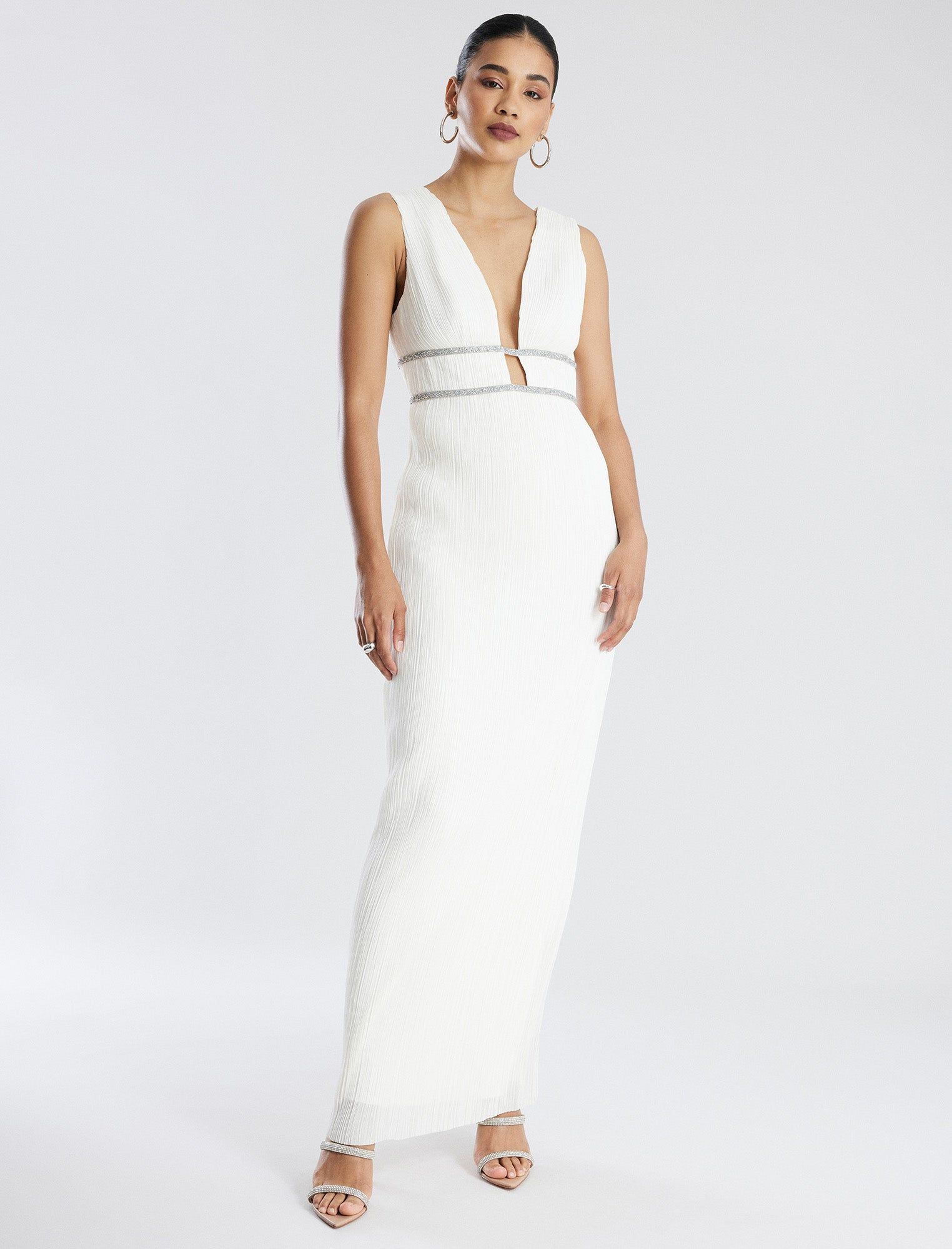 Clara Pleated Gown sold by BCBGMaxAzria