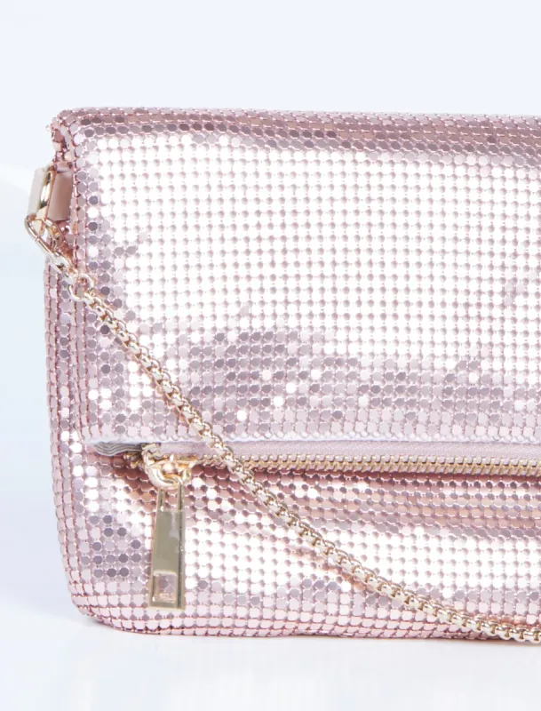 Tyra Foldover Clutch sold by BCBGMaxAzria