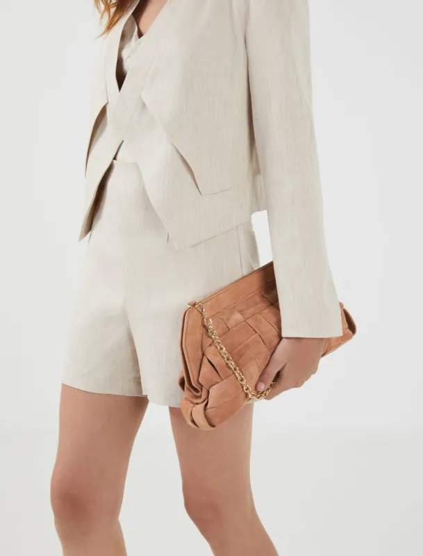Beverly Padded Braided Leather Clutch sold by BCBGMaxAzria