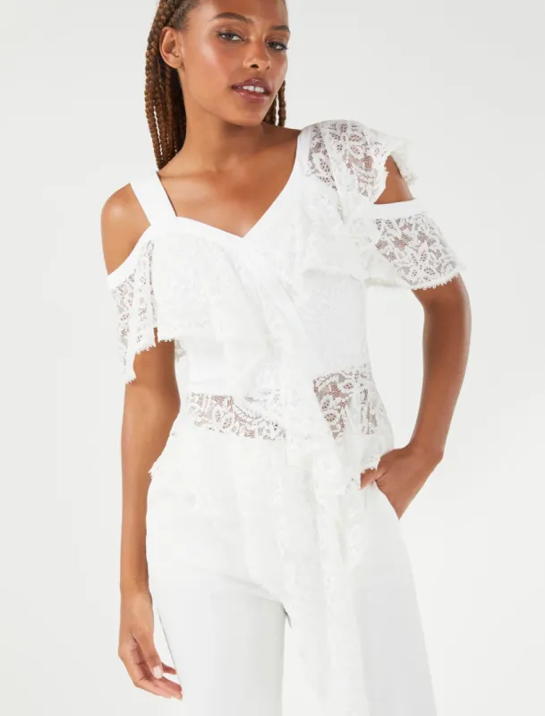 Asymmetrical Cold Shoulder Lace Top sold by BCBGMaxAzria