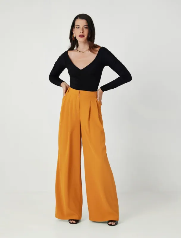 Ruched Long Sleeve Bodysuit sold by BCBGMaxAzria