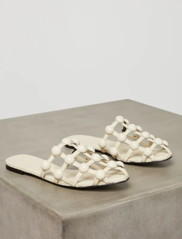 Tina Caged Stud Slide Sandal sold by BCBGMaxAzria