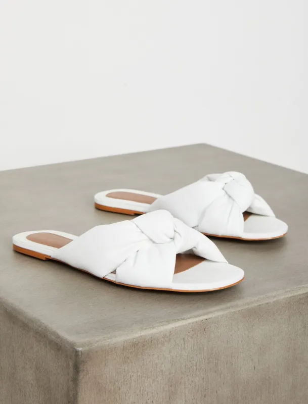 Tinsley Knotted Flat Sandal sold by BCBGMaxAzria