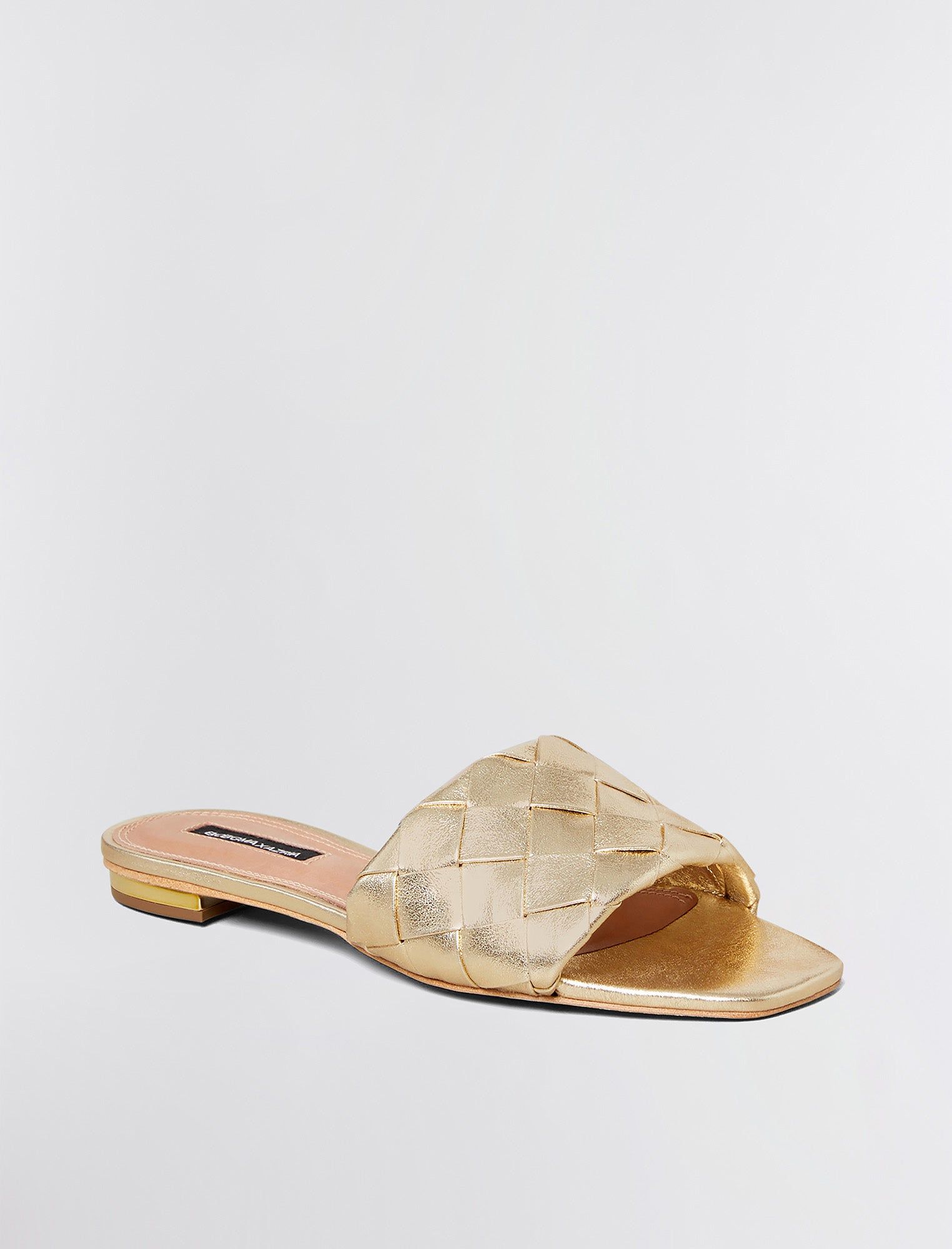 Remi Flat Slide sold by BCBGMaxAzria