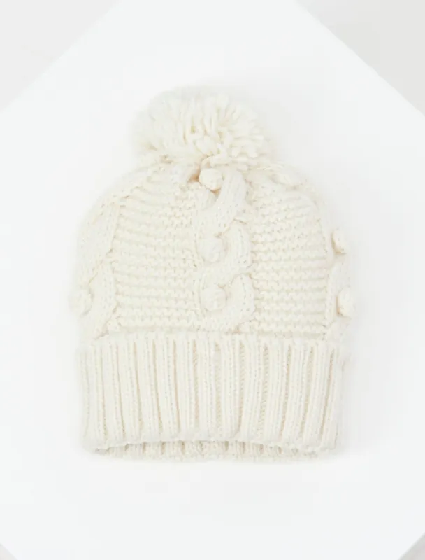 Girls Popcorn Cable Knit Pom Beanie sold by BCBGMaxAzria