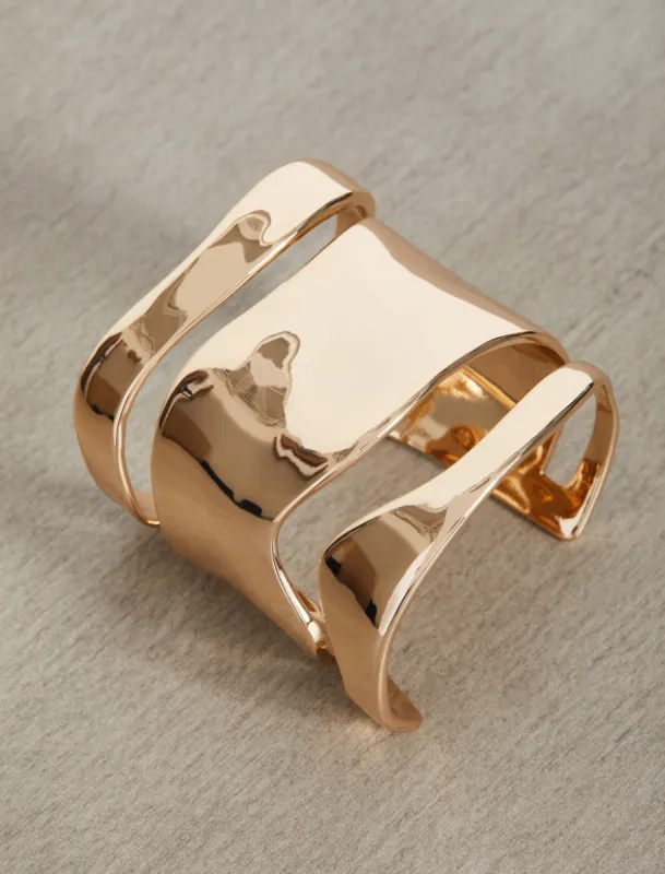 Hammered Gold Cuff Bracelet sold by BCBGMaxAzria