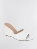 Giani Wedge Sandal sold by BCBGMaxAzria