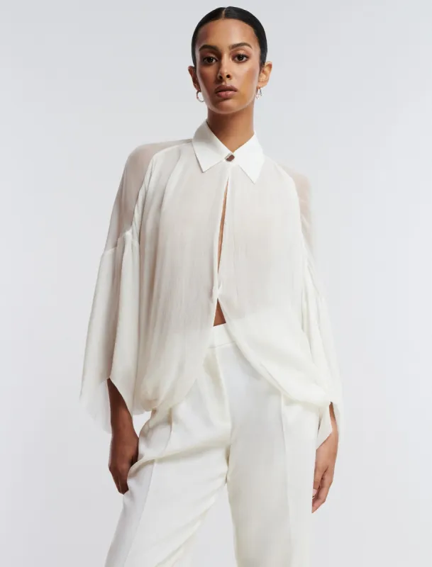 Button-Up Cape Top sold by BCBGMaxAzria