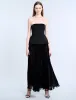 Strapless Peplum Gown sold by BCBGMaxAzria