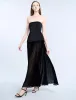Strapless Peplum Gown sold by BCBGMaxAzria
