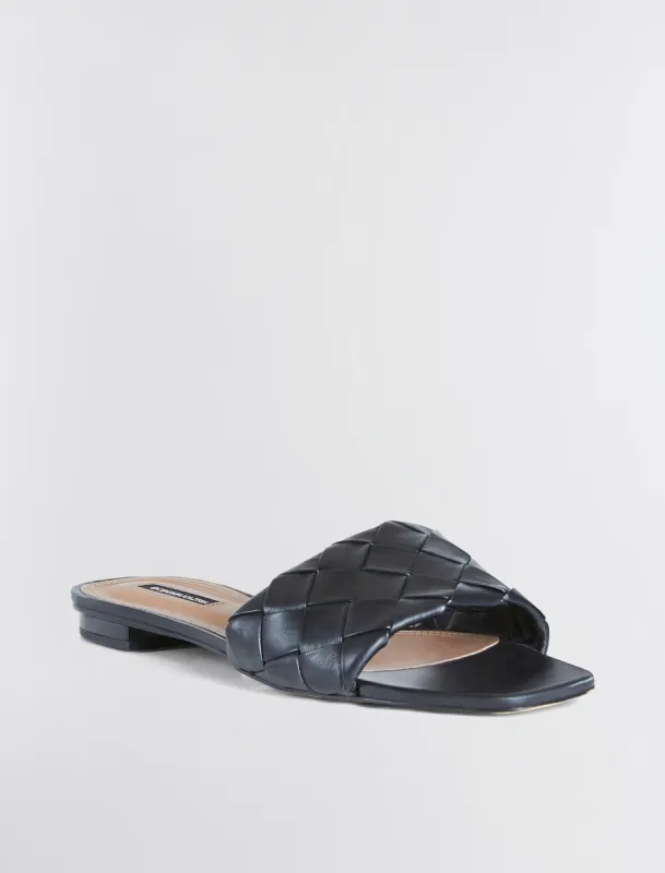 Remi Flat Slide sold by BCBGMaxAzria