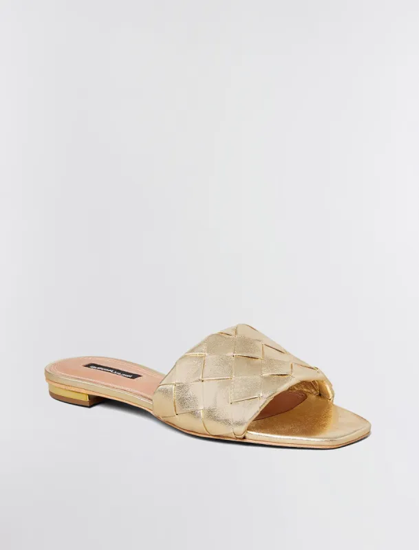 Remi Flat Slide sold by BCBGMaxAzria