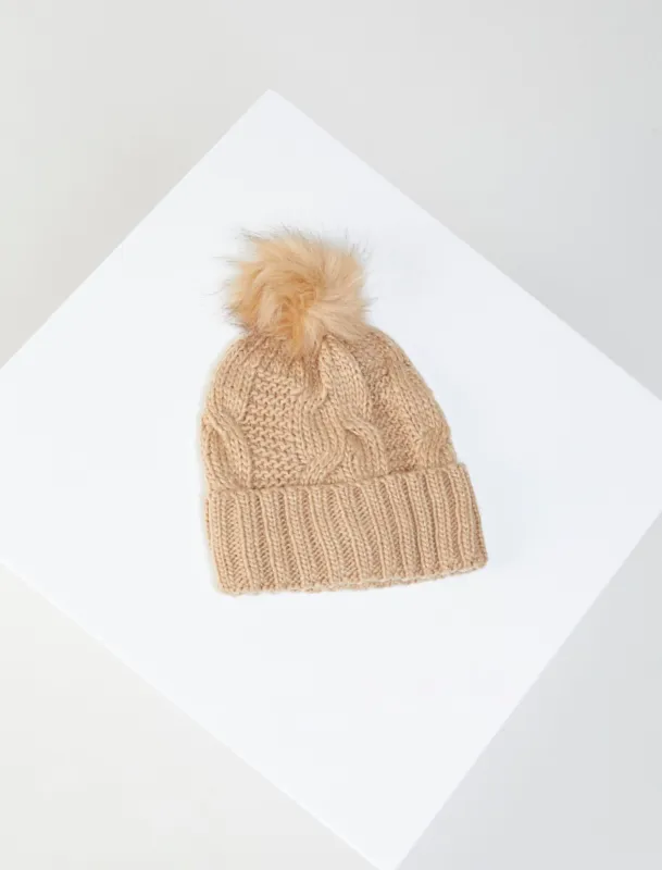 Metallic Cable Knit Faux Fur Pom Beanie sold by BCBGMaxAzria