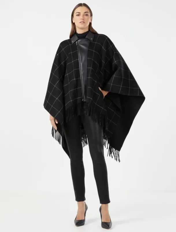 Faux Leather Trim Fringed Cape sold by BCBGMaxAzria