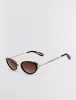 1994 Oval Classic Sunglasses sold by BCBGMaxAzria