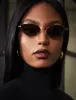 1994 Oval Classic Sunglasses sold by BCBGMaxAzria