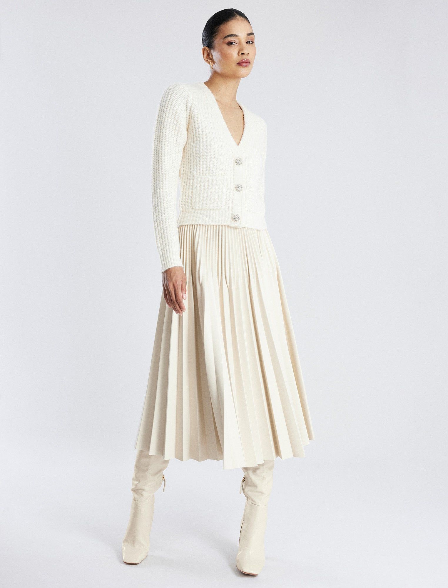 Audette Faux Leather Pleated Midi Skirt sold by BCBGMaxAzria