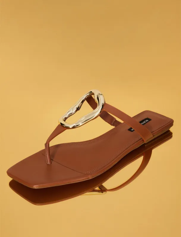 Kima Flat Sandal sold by BCBGMaxAzria