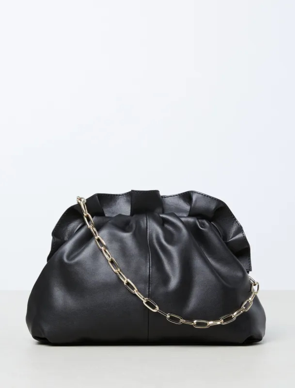 Christy Ruffle Clutch sold by BCBGMaxAzria