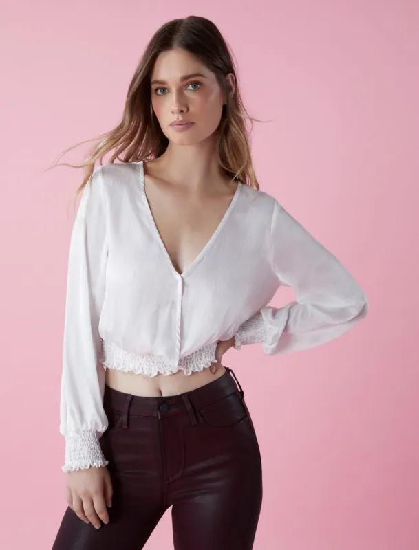 Long Sleeve Smocked Crop Top sold by BCBGMaxAzria