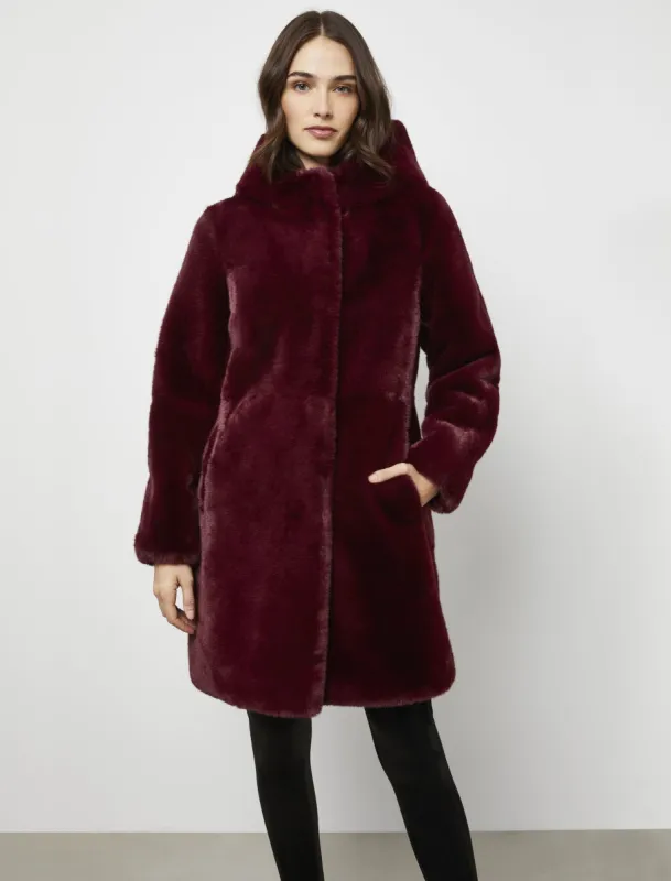 Hooded Faux Fur Coat sold by BCBGMaxAzria
