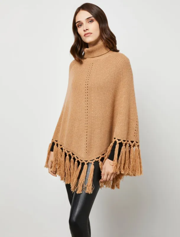 Turtleneck Fringe Cape made by BCBGMaxAzria