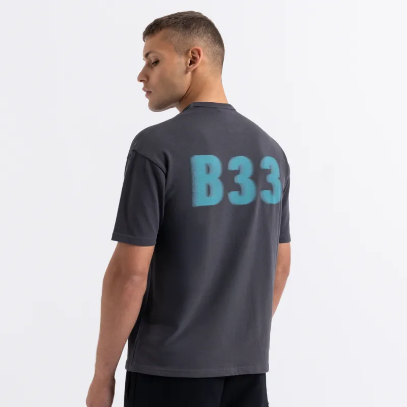 Hallberg T-Shirt - Charcoal/Turquoise sold by be inspired