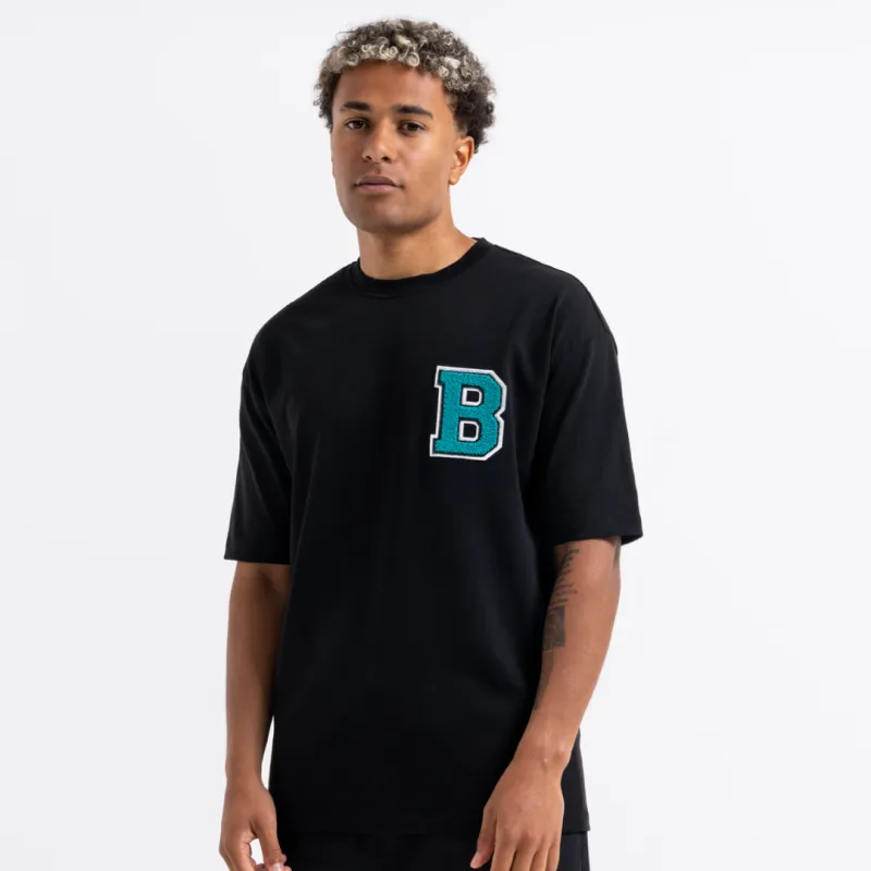 Adams T-Shirt - Black sold by be inspired