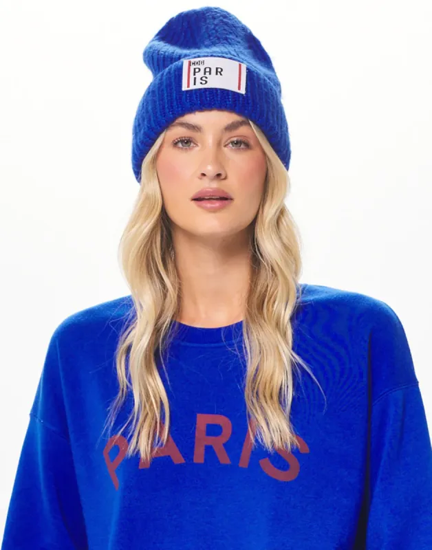 Paris Boarding Pass Beanie by Vintage Havana - Royal Blue sold by Beach Bunny