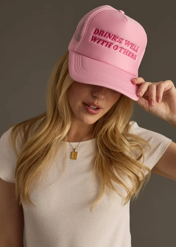 Panache Apparel Co. - Drinks Well With Others Trucker Hat - Light Pink sold by Beach Bunny