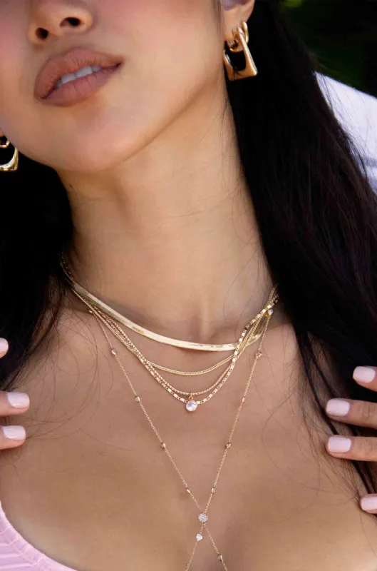 All the Chains Layered Necklace by Ettika sold by Beach Bunny